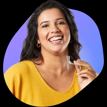 Woman with yellow shirt and aligner