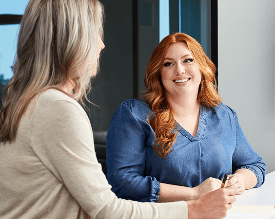 Dental professional explaining treatment options to patient