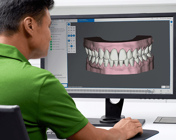 Dental team working efficiently with digital tools in modern office